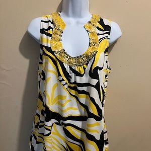 Top, sleeveless, yellow, black, white print, flower beaded design at neckline.